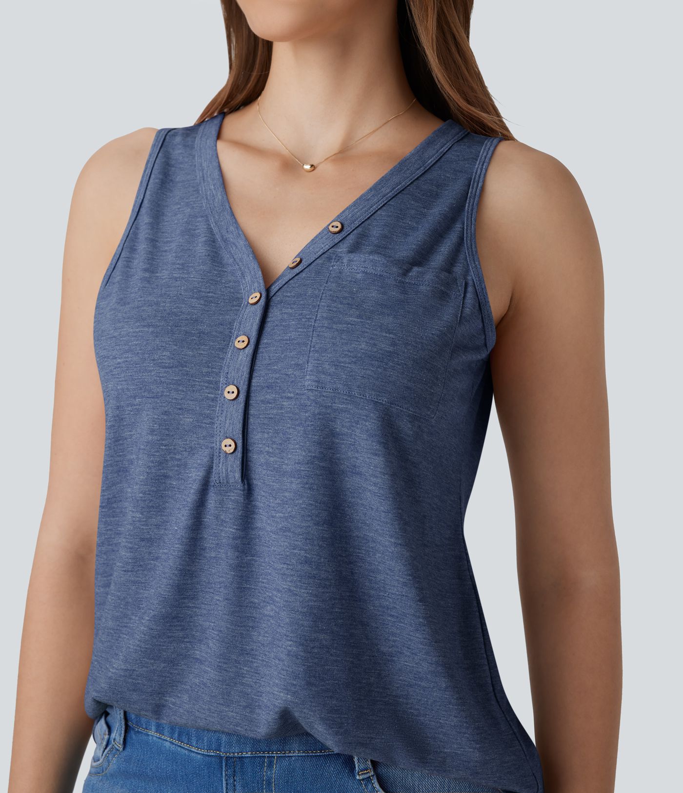 Top décontracté sans manches à col en V avec détails décoratifs