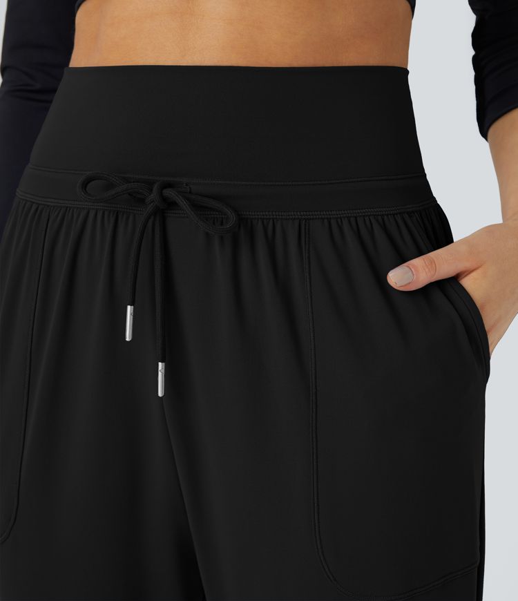 Knöchellange, lässige, plissierte, konische Jogginghose mit hoher Taille, Kordelzug und Seitentaschen