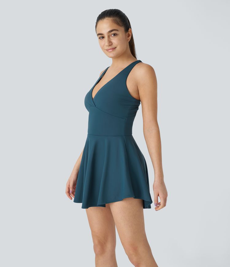 Robe Sport Mini Évasée 2-en-1 avec Découpe et Poches Latérales Dos Nu