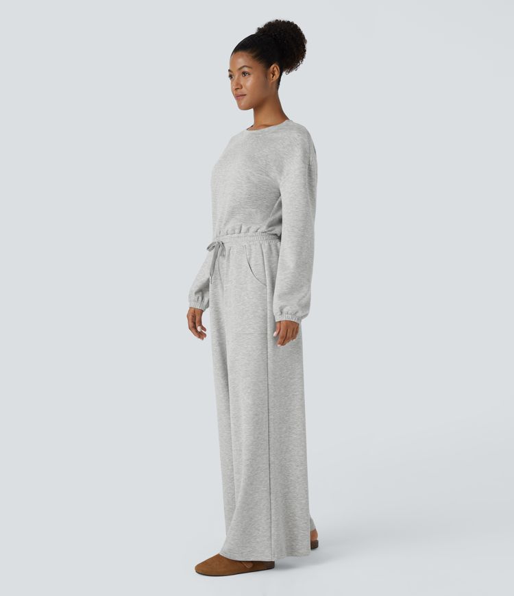 Combinaison décontractée col rond, fermoir en G au dos, manches longues, cordon de serrage et poches latérales