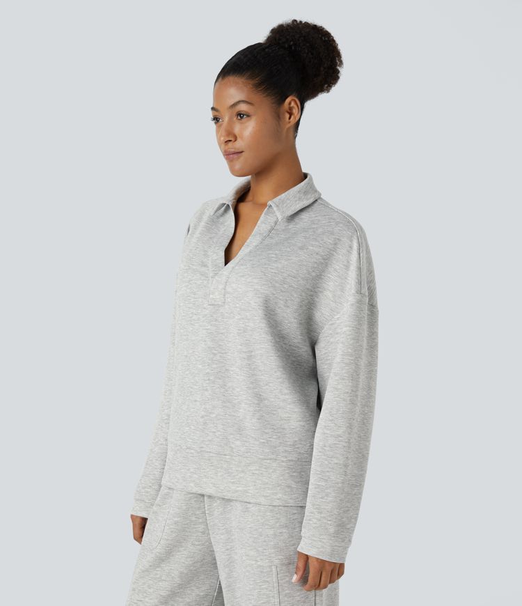 Sudadera holgada cuello V botón hombro caído manga larga abertura