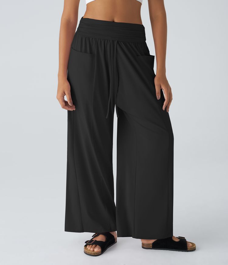 Pantalón cargo harén pierna ancha bolsillo lateral cordón plegable tiro medio