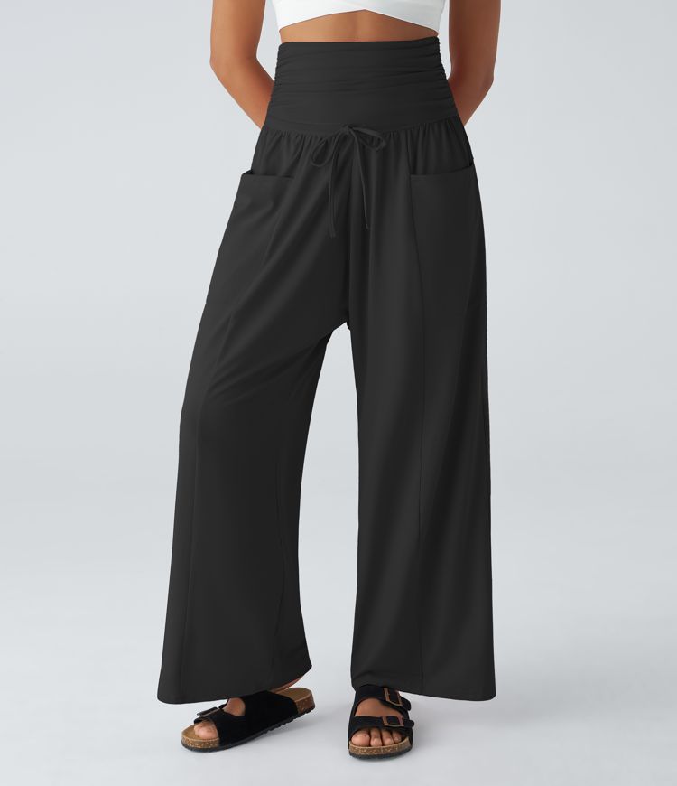 Pantalón cargo harén pierna ancha bolsillo lateral cordón plegable tiro medio