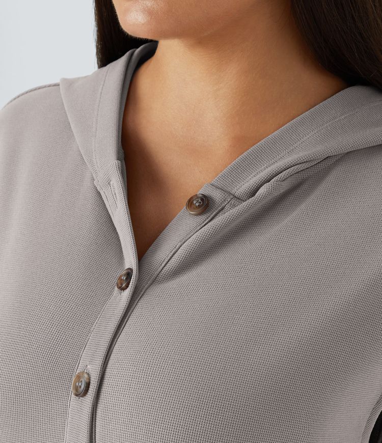 Mono capucha botón parte delantera sin mangas bolsillo lateral gofre