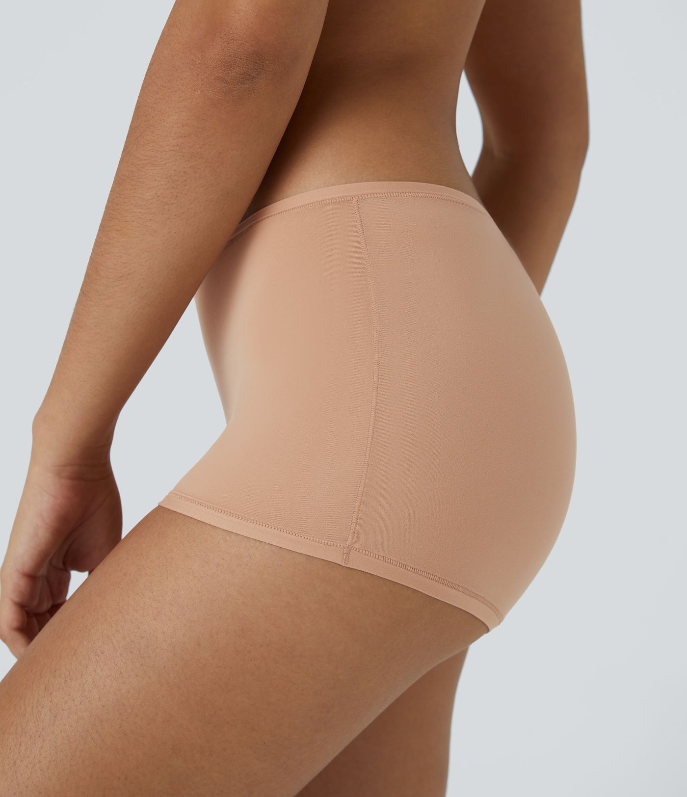 Short de détente garçon à taille basse et grande extensibilité uni