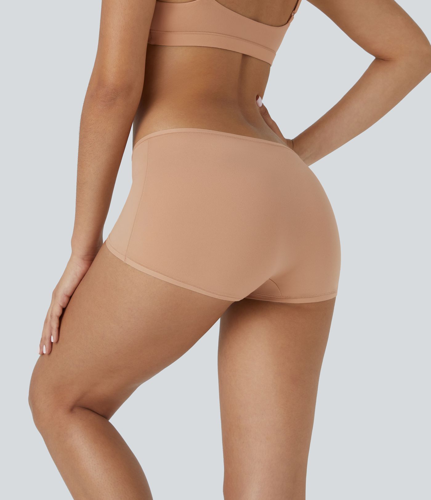 Short de détente garçon à taille basse et grande extensibilité uni