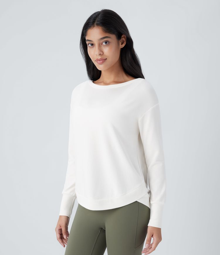 Top deportivo yoga polar dobladillo curvo manga larga cuello barco