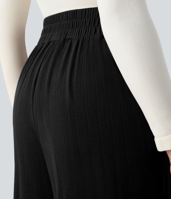 Pantalon décontracté ample à taille haute, plissé et à poches latérales