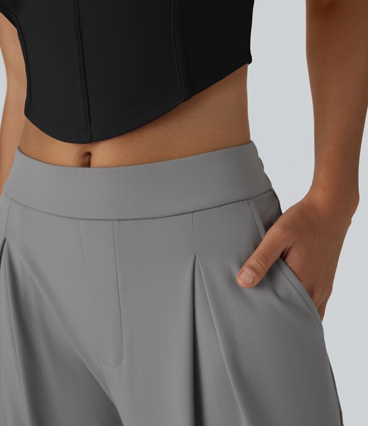 Pantalón cargo pierna ancha múltiple bolsillo plisado tiro alto