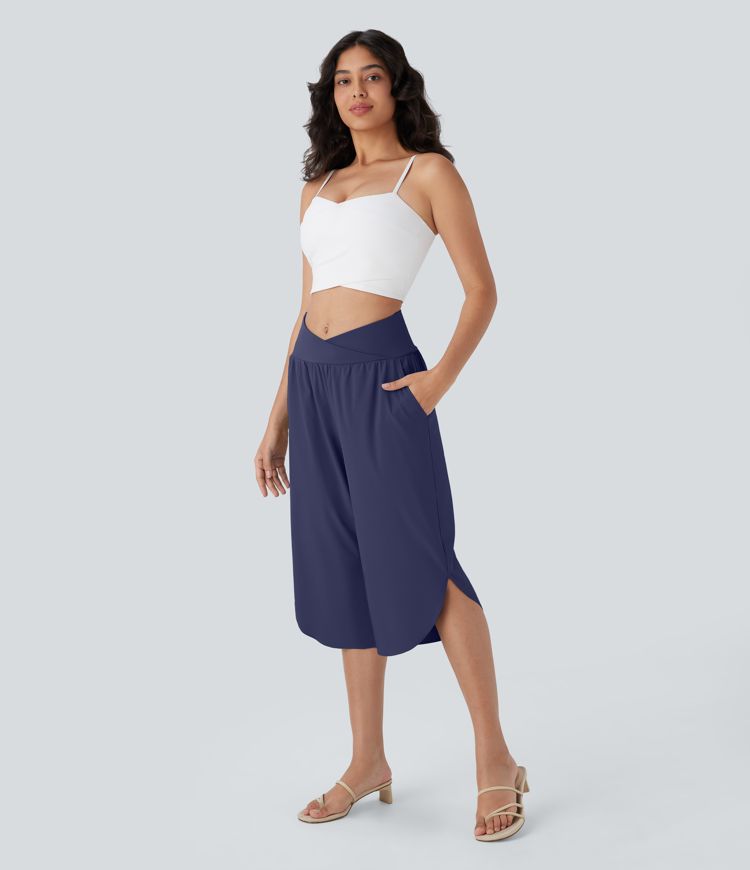 Breezeful™ Capri-Resorthose mit hoher Taille, gekreuzten Seitentaschen und geteiltem Schnitt, schnelltrocknend