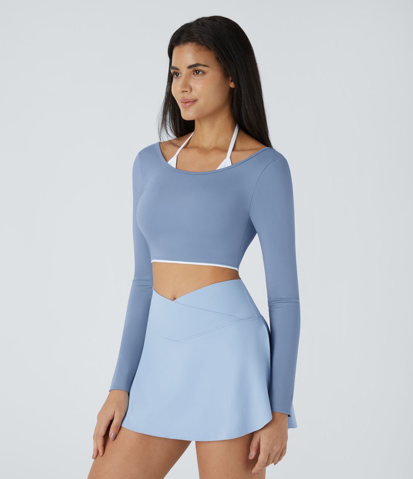 Softlyzero™ Airy Kurzes, rückenfreies Yoga-Sport-Top mit Neckholder, langen Ärmeln und Farbblock