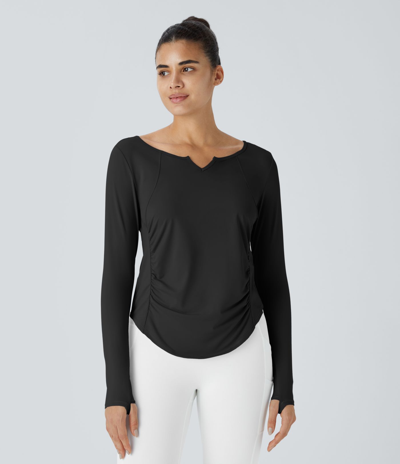 Notch collar thumb hole ruched detailing curved hem yoga sports top