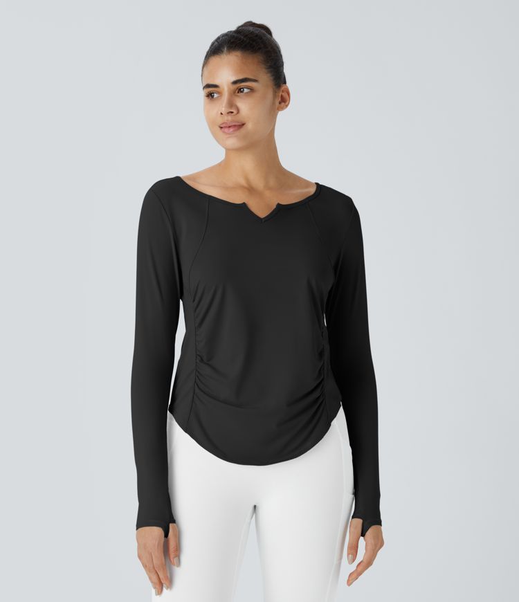 Notch collar thumb hole ruched detailing curved hem yoga sports top