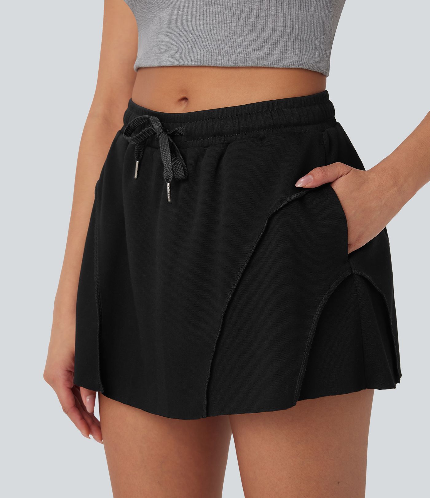 Jupe décontractée micro mini 2-en-1 taille moyenne avec cordon de serrage et poches latérales