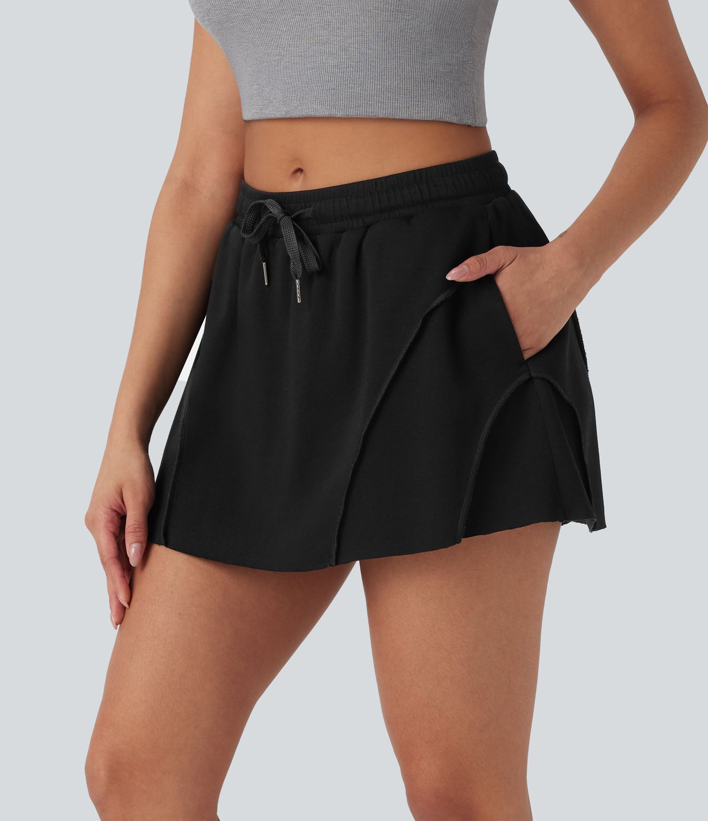 Jupe décontractée micro mini 2-en-1 taille moyenne avec cordon de serrage et poches latérales