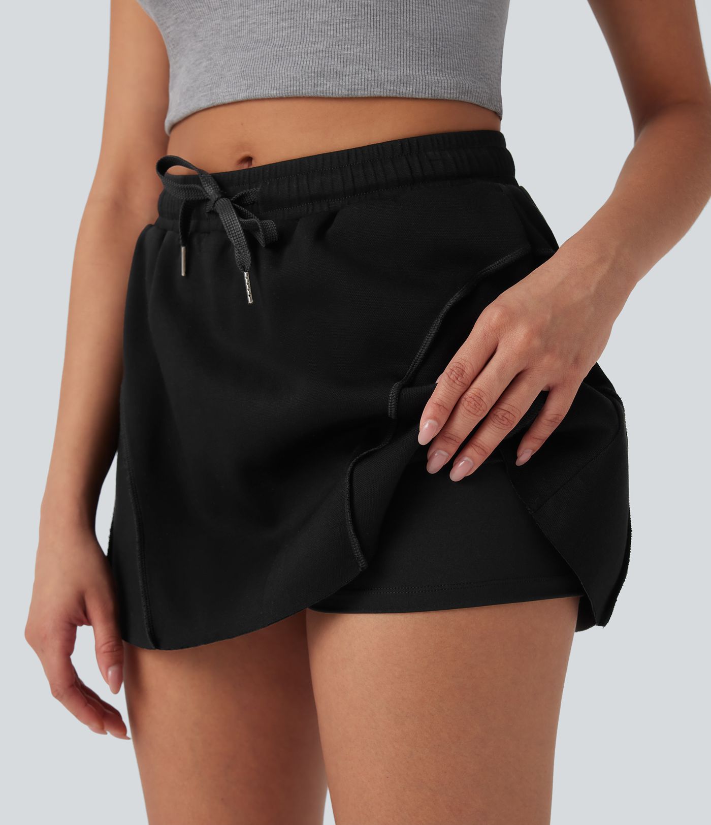 Jupe décontractée micro mini 2-en-1 taille moyenne avec cordon de serrage et poches latérales