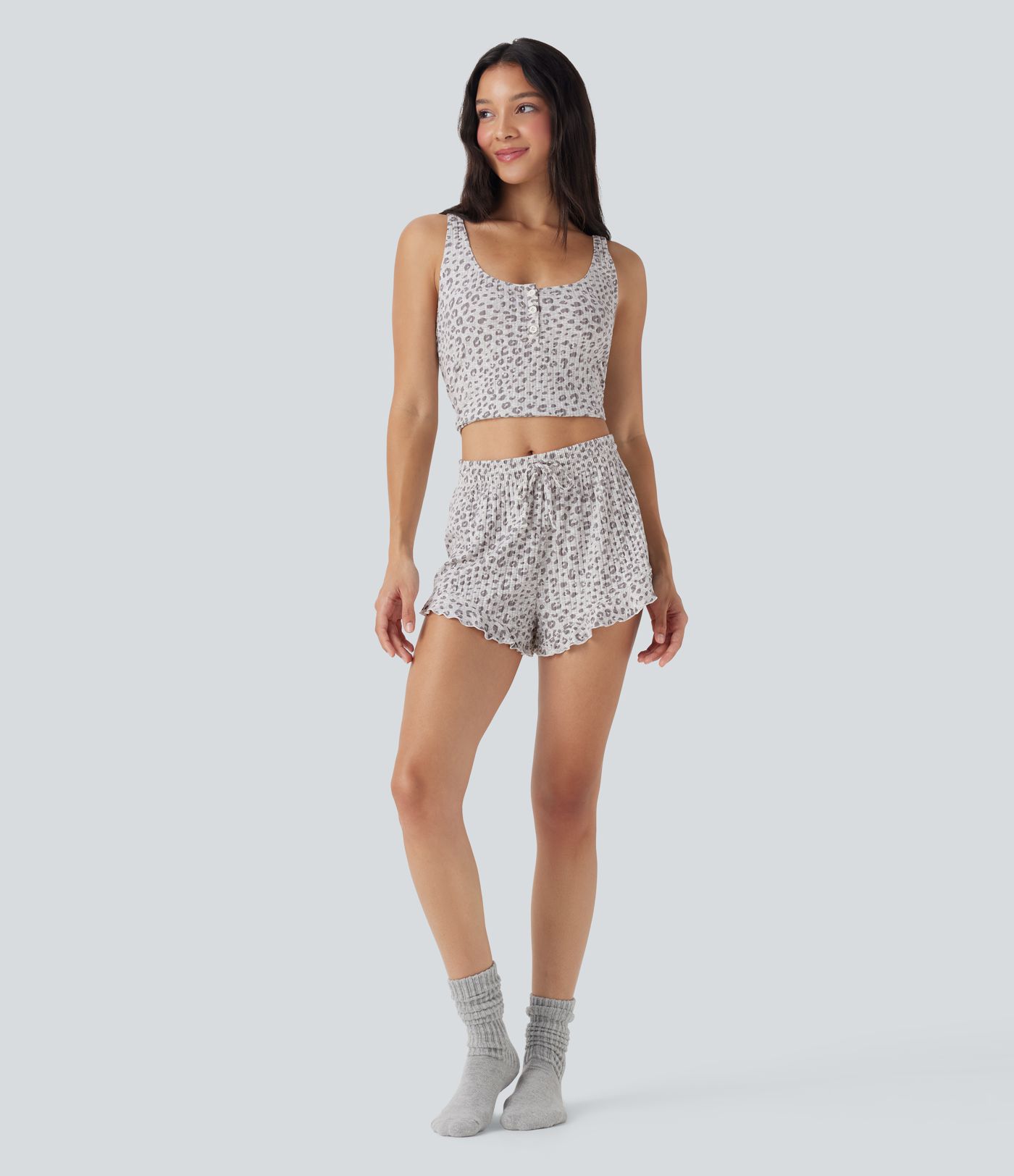 Mittlere Loungehose mit Kordelzug und Rüschensaum im Leopardenmuster Mittlere Loungehose mit Kordelzug und Rüschensaum im Leopardenmuster