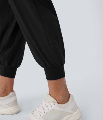 Breezeful™ Crossover joggers de yoga de talle alto con bolsillos y secado rápido Breezeful™ Crossover joggers de yoga de talle alto con bolsillos y secado rápido