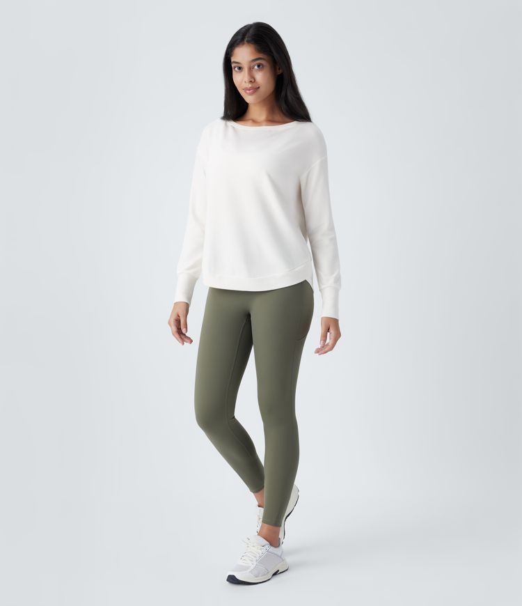 Top deportivo yoga polar dobladillo curvo manga larga cuello barco