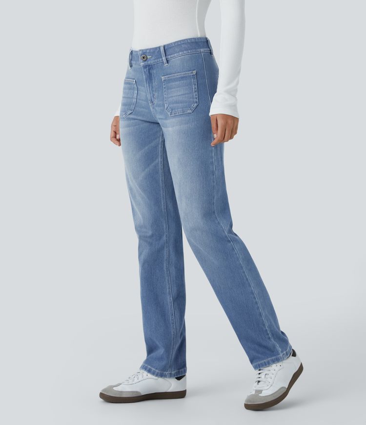 Jean décontracté délavé taille basse en maille extensible, coupe droite avec poches avant et fermeture zippée