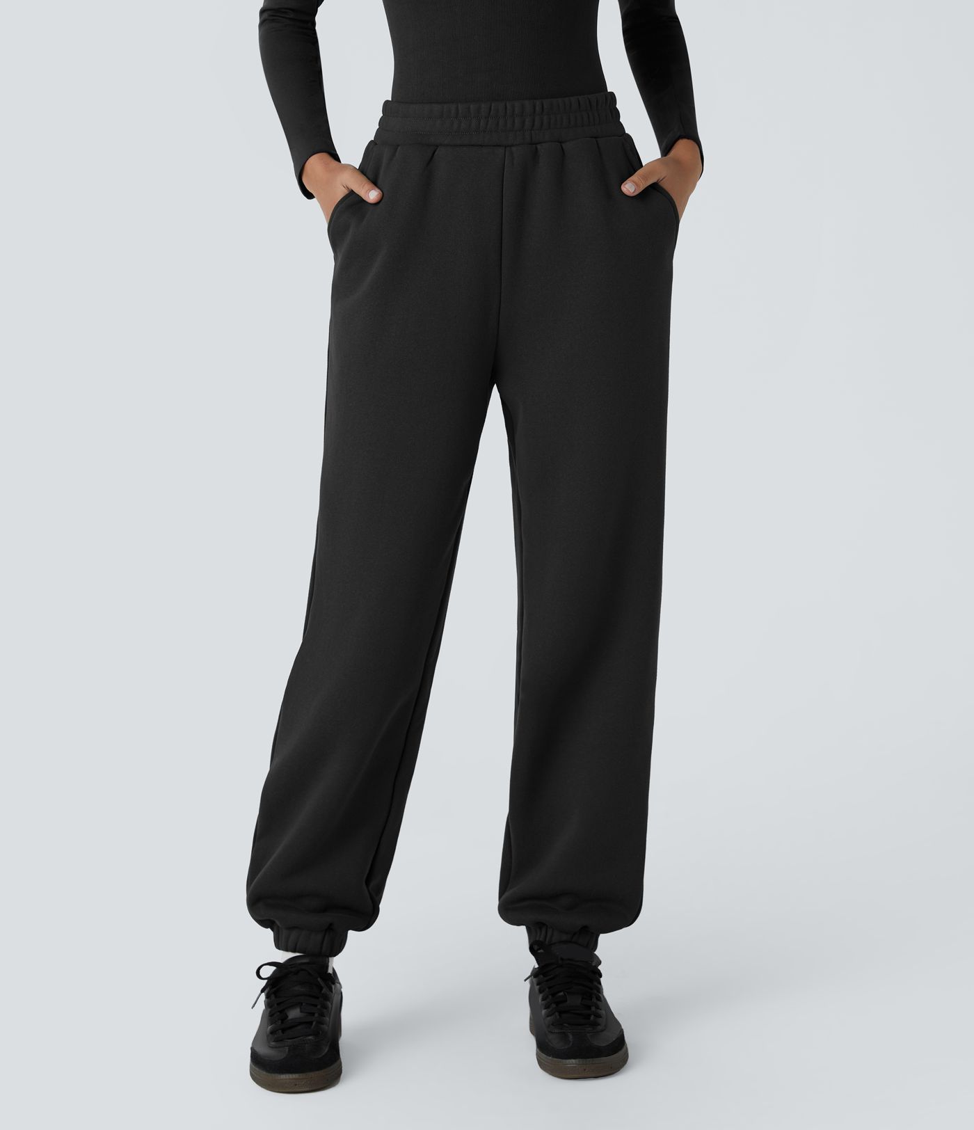 Pantalón deportivo térmico bolsillo lateral tiro medio