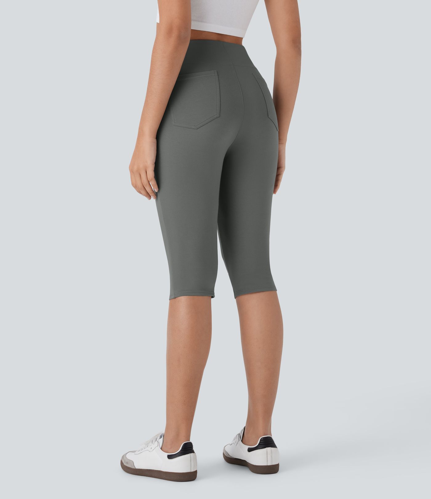 Pantalones pirata casuales de tiro alto con bolsillos