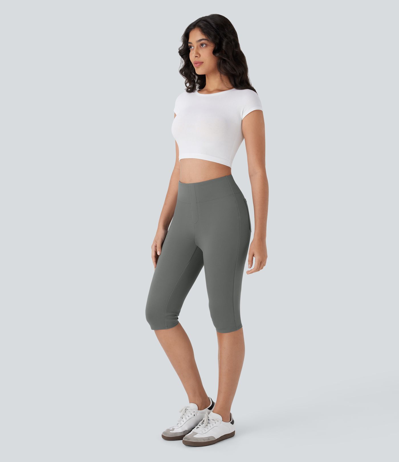 Pantalones pirata casuales de tiro alto con bolsillos