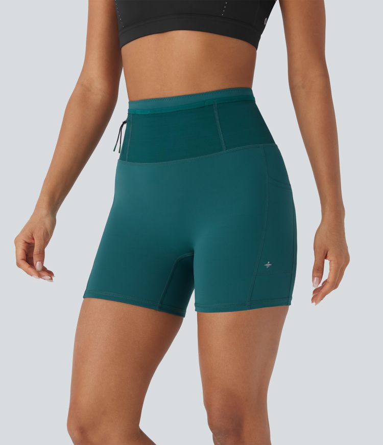 Shorts tipo biker de running SpeedWave™ de tiro alto moldeador abdominal  con malla de contraste y de secado rápido en longitud 12,7cm y bolsillos 360°