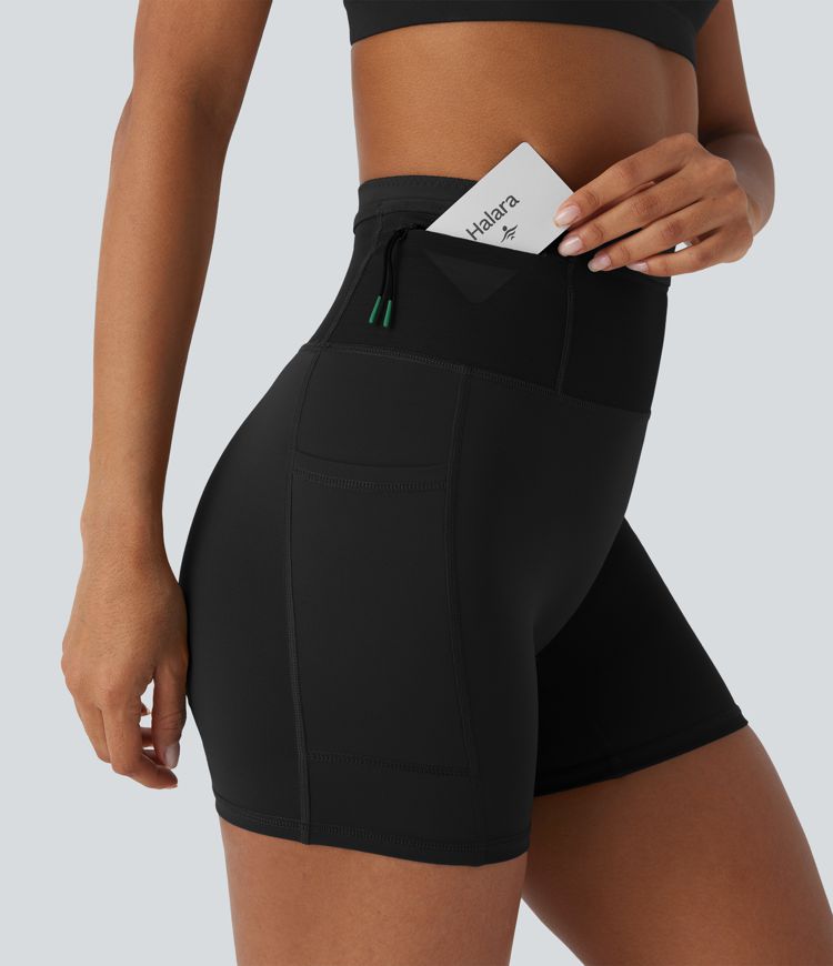 Shorts tipo biker de running SpeedWave™ de tiro alto moldeador abdominal  con malla de contraste y de secado rápido en longitud 12,7cm y bolsillos 360°