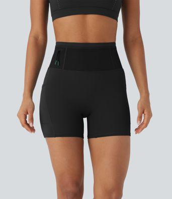 Shorts tipo biker de running SpeedWave™ de tiro alto moldeador abdominal  con malla de contraste y de secado rápido en longitud 12,7cm y bolsillos 360°