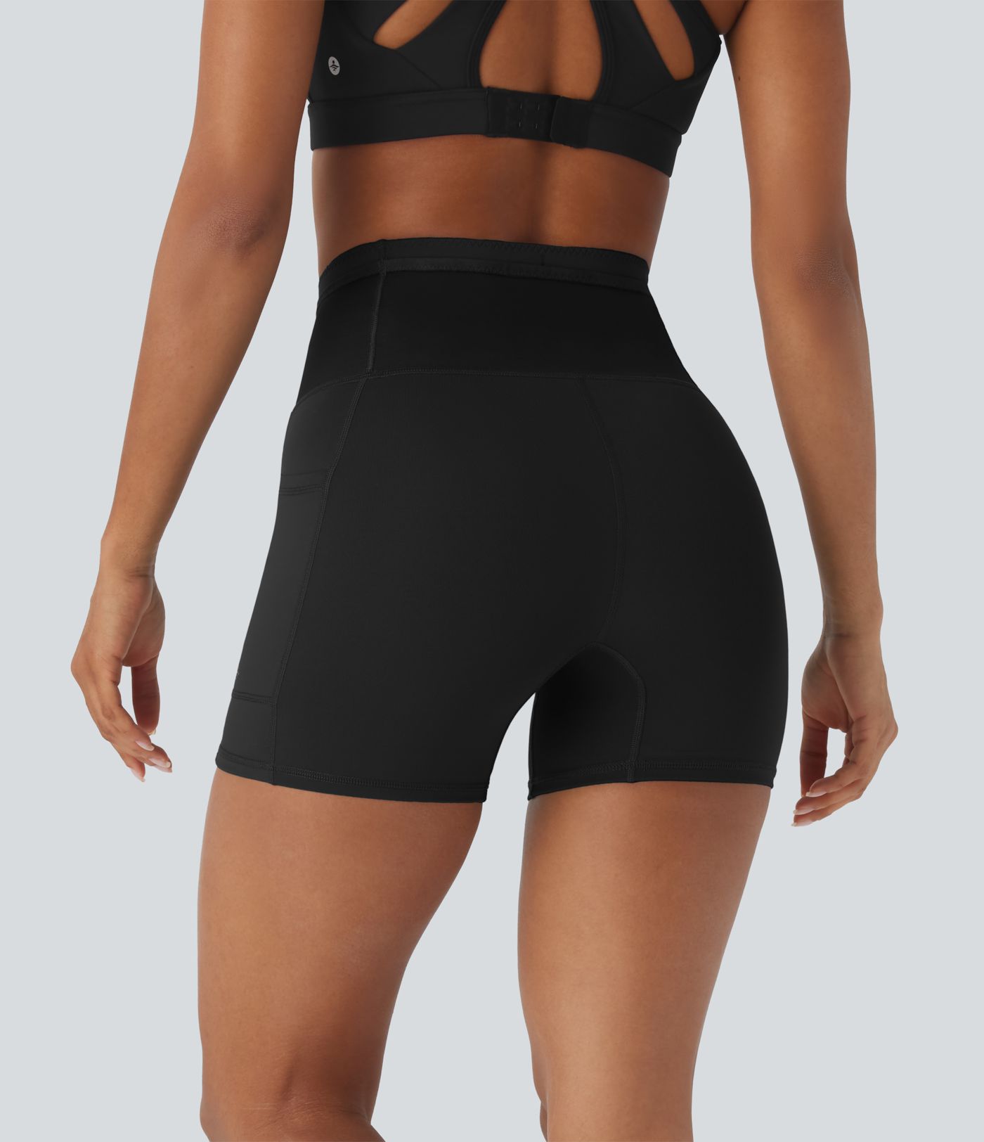 Shorts tipo biker de running SpeedWave™ de tiro alto moldeador abdominal  con malla de contraste y de secado rápido en longitud 12,7cm y bolsillos 360°