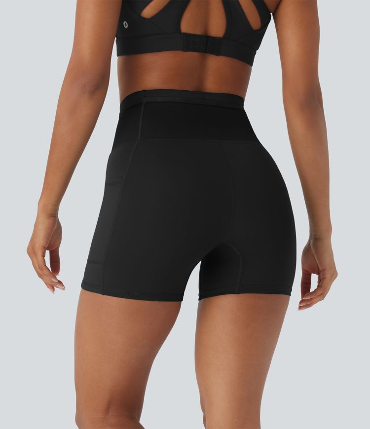 Shorts tipo biker de running SpeedWave™ de tiro alto moldeador abdominal  con malla de contraste y de secado rápido en longitud 12,7cm y bolsillos 360°