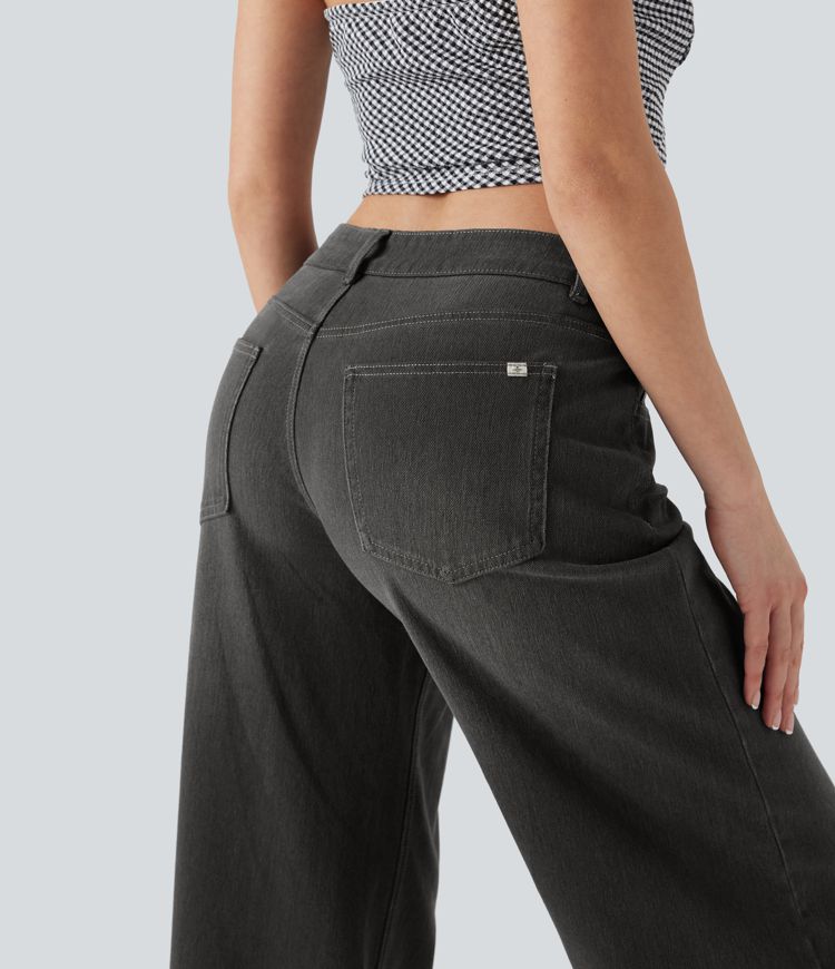Halara Flex™ Jean large asymétrique taille basse avec bouton, fermeture éclair et poches multiples, délavé et extensible en maille