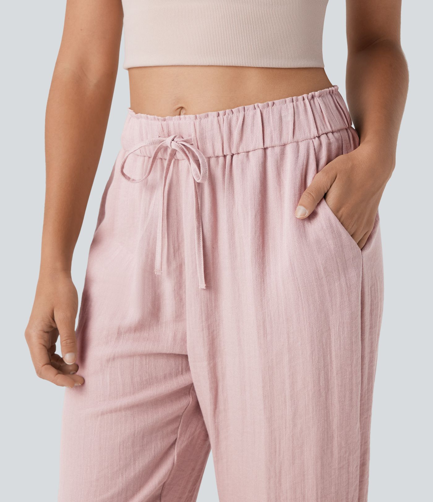 Pantalones casuales ajustados de tiro medio con cordón y bolsillos