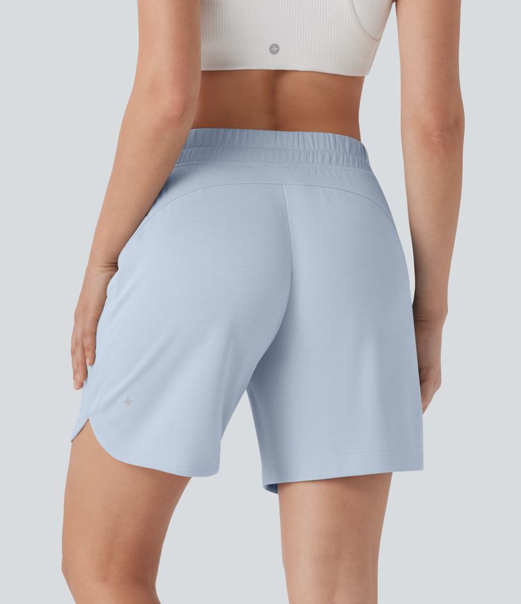 Bermudas de yoga con cintura media, bolsillos laterales y dobladillo curvo