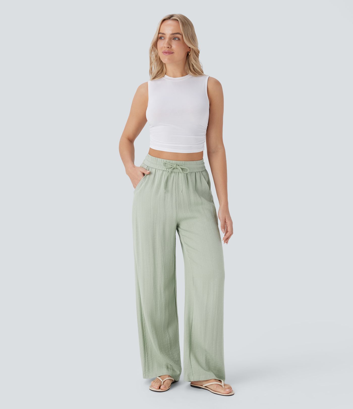 High-waisted trousers with drawstring and pockets, wide leg, casual linen look
