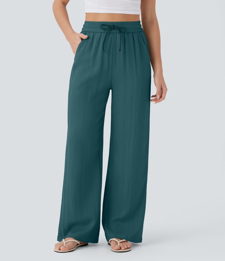 Pantalon large fluide taille haute avec cordon de serrage, poches latérales et aspect lin
