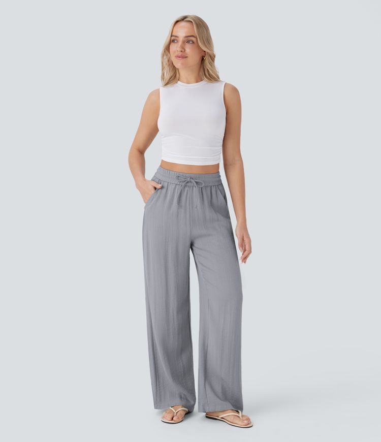 Pantalon large fluide taille haute avec cordon de serrage, poches latérales et aspect lin