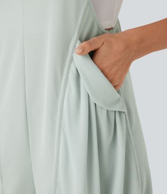 Overol casual con botones tirantes ajustables y bolsillos laterales