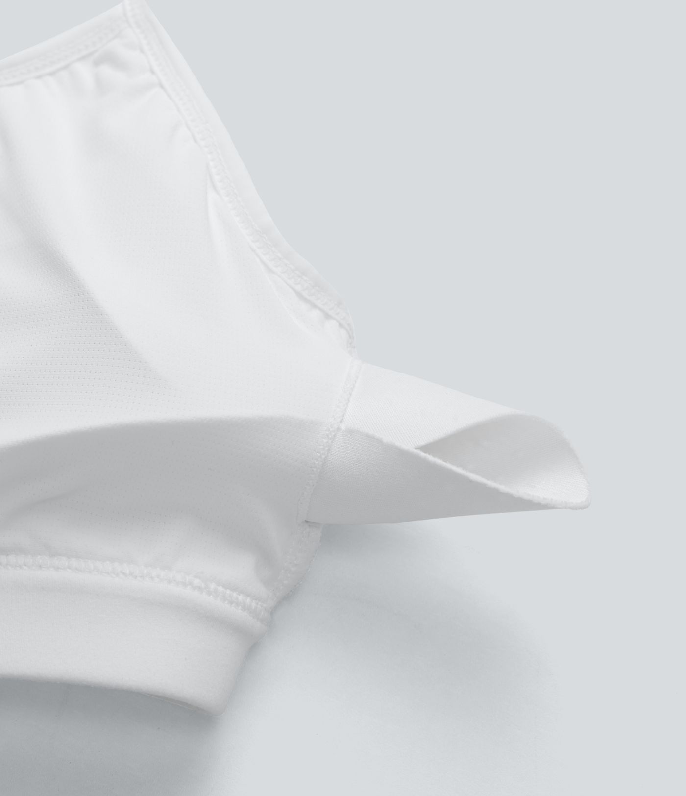 Brasier deportivo acanalado para yoga de sujeción baja con abertura en copas A-C