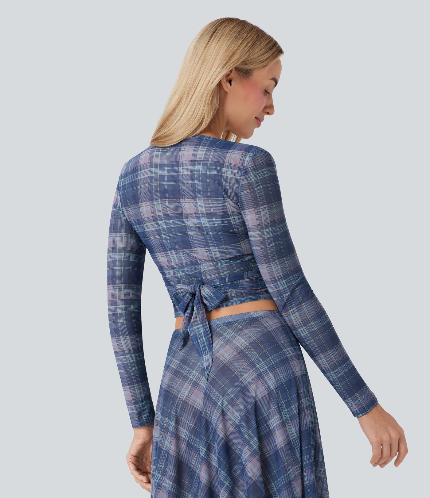 Haut à col en V en maille transparente avec liens au dos