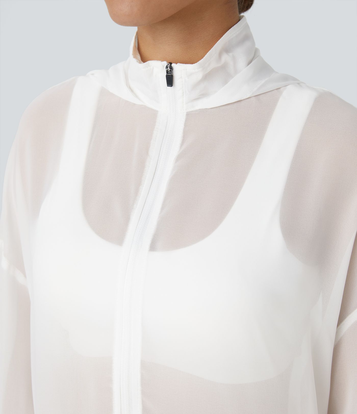 Chaqueta de gasa transparente extra grande con capucha cordón ajustable y cremallera para senderismo