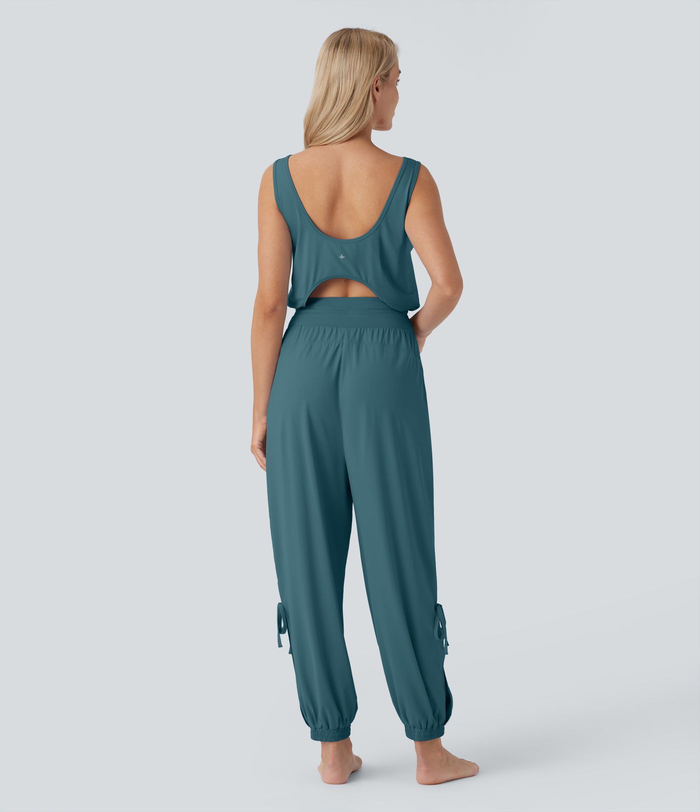 Mono de Yoga Sin Mangas en Corte y Bolsillo en Cordón de Toque Fresco-UPF50+