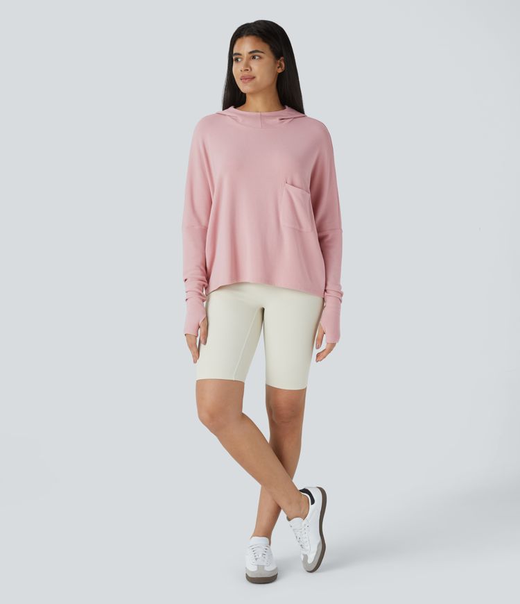 Sudadera térmica capucha bolsillo pulgar manga murciélago