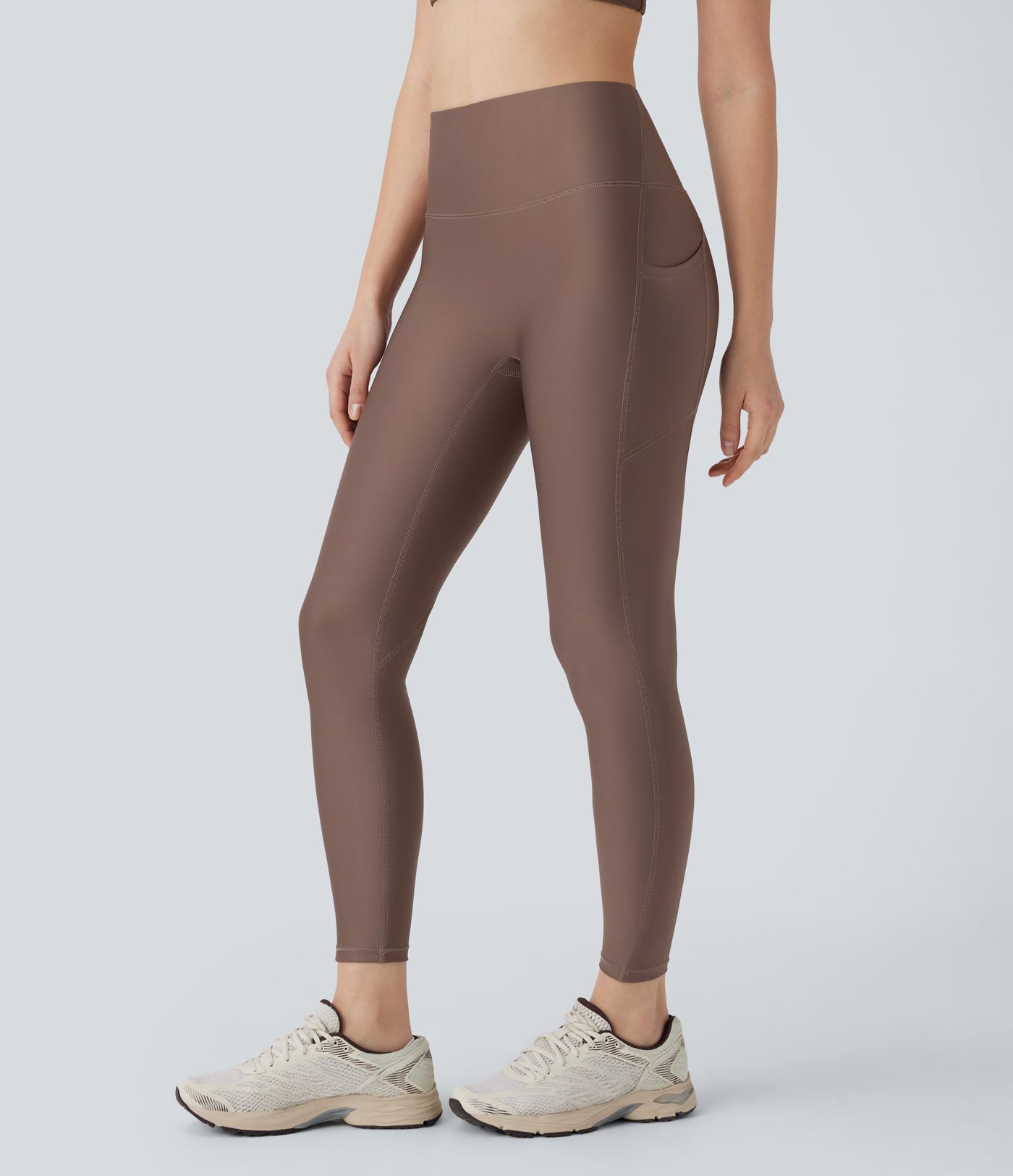 Leggings deportivo tiro alto bolsillo lateral efecto brillante