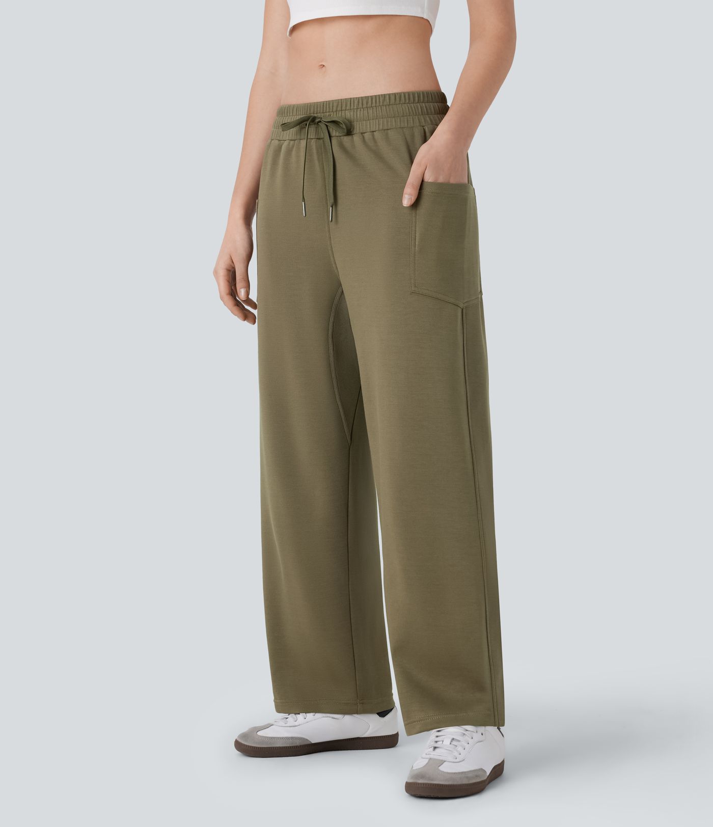 Pantalones casuales ajustados de tiro bajo con bolsillos laterales y cordón