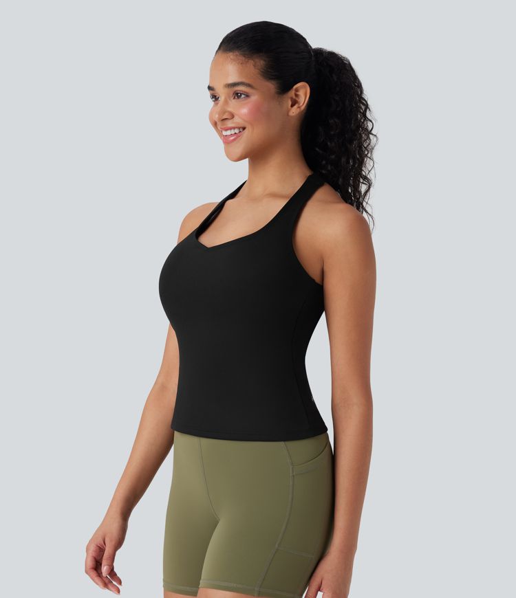 Camiseta de tirantes cruzada para running con espalda abierta