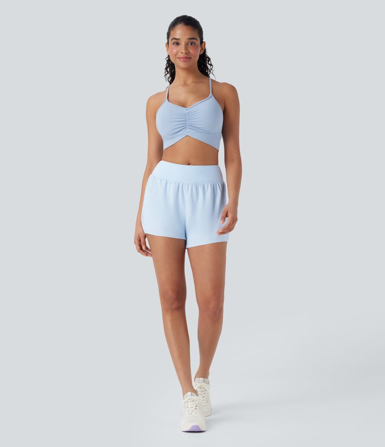 Shorts de yoga 2 en 1 de tiro medio con malla en contraste y bolsillos