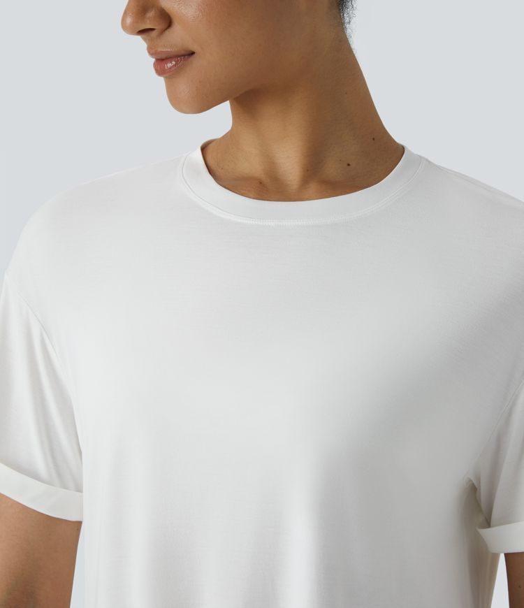 Top deportivo yoga cuello redondo manga enrollada dobladillo curvo dividido