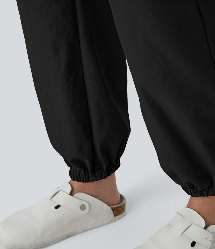 Jogging décontracté en polaire taille haute avec boutons, fermeture éclair, plis et poches latérales